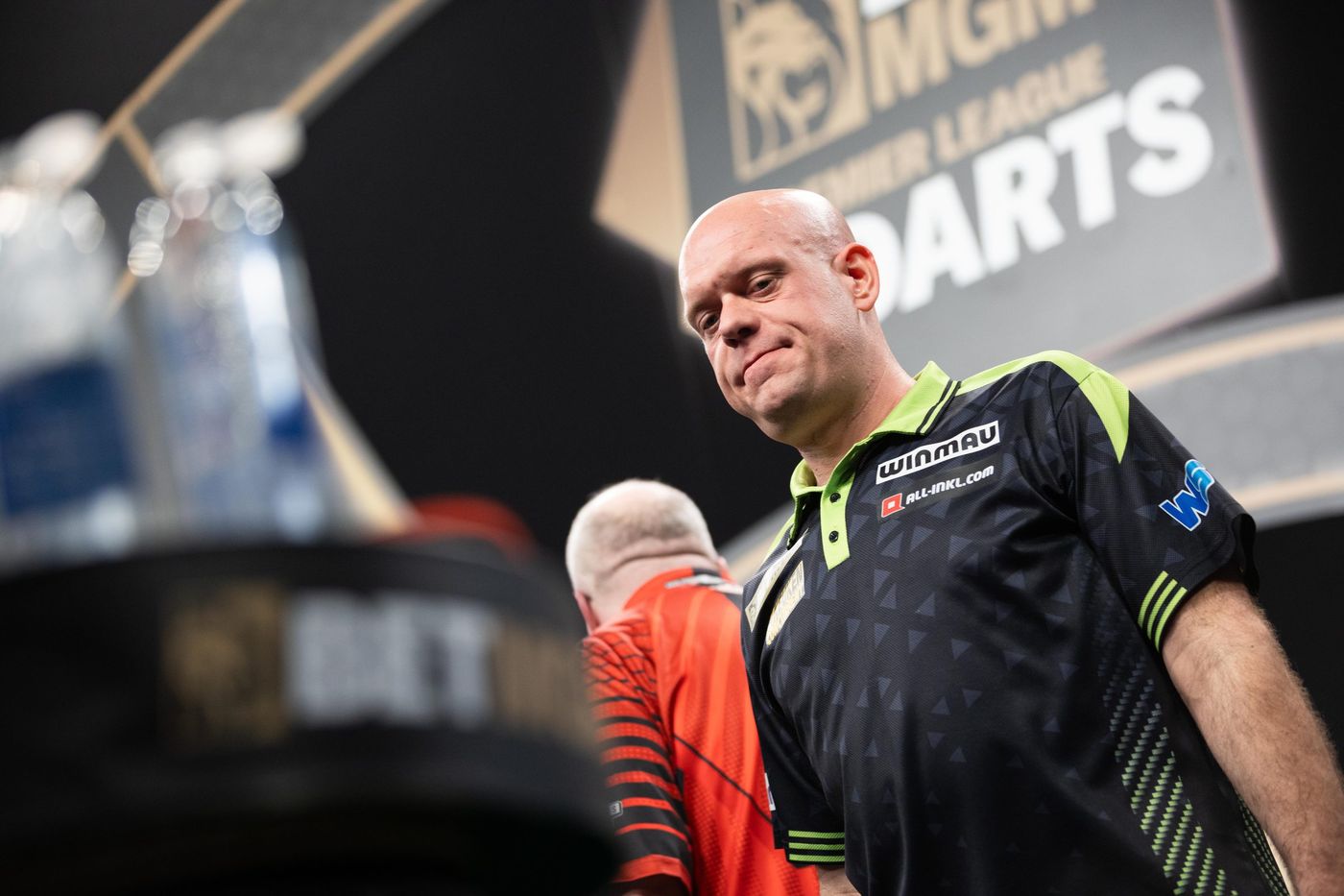 Darts player walking on stage