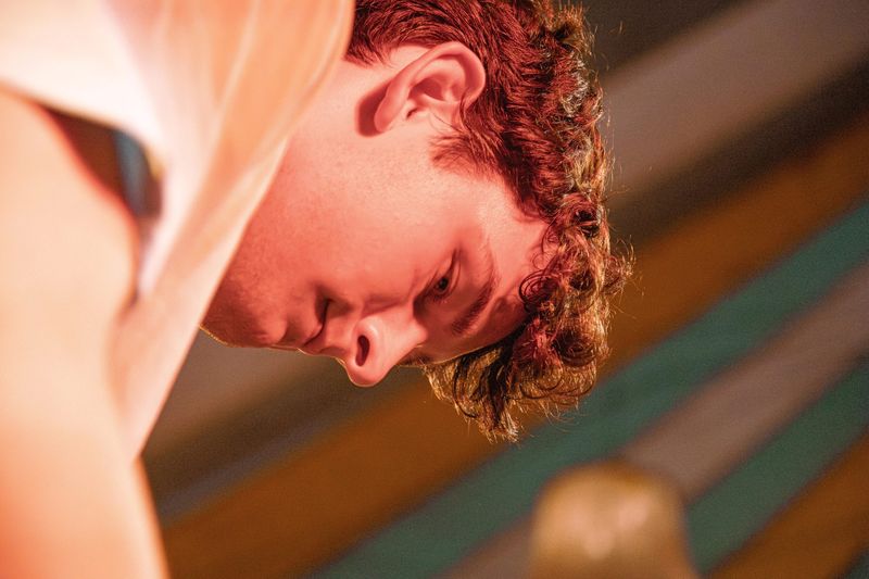 Singer singing into a microphone close-up